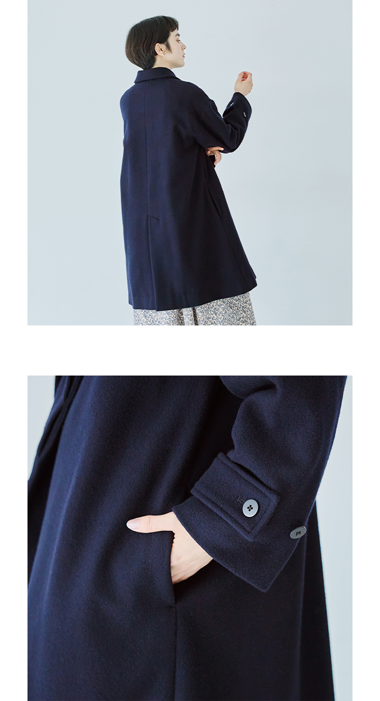 メルトントグルコートの裾とサイドポケットのディテール