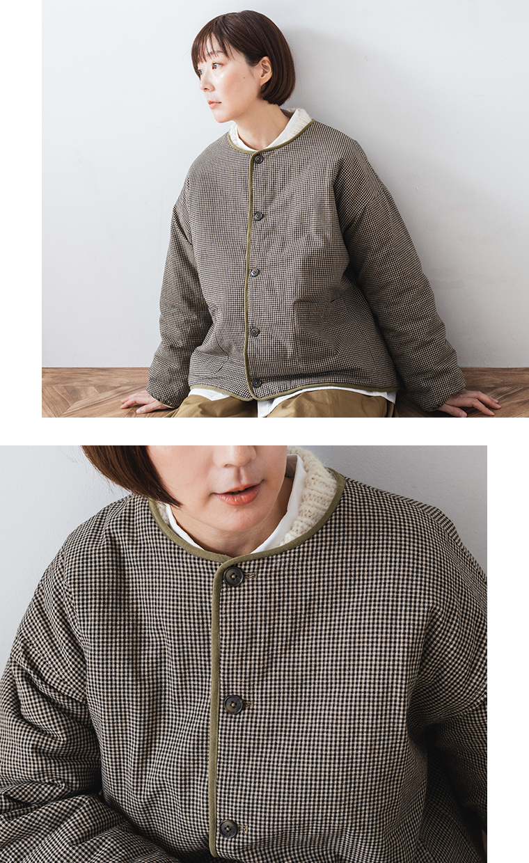 リバーシブルキルティングジャケット（ギンガムチェック）を着た女性のイメージ写真